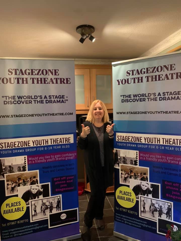 Michelle with Stagezone Youth Theatre banners