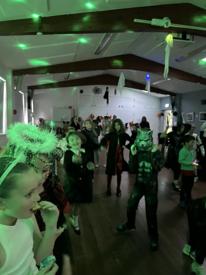 This image shows young people at Stagezone's Halloween party dancing and having fun.