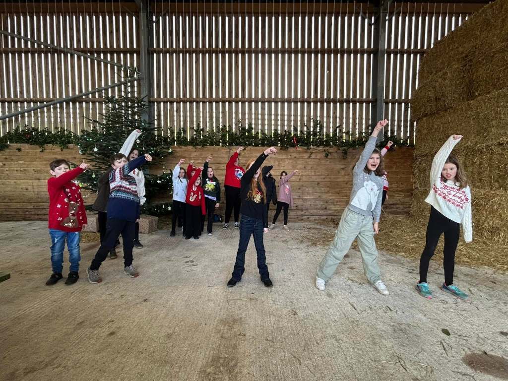 This image shows some of Stagezone's children performing at a Christmas market