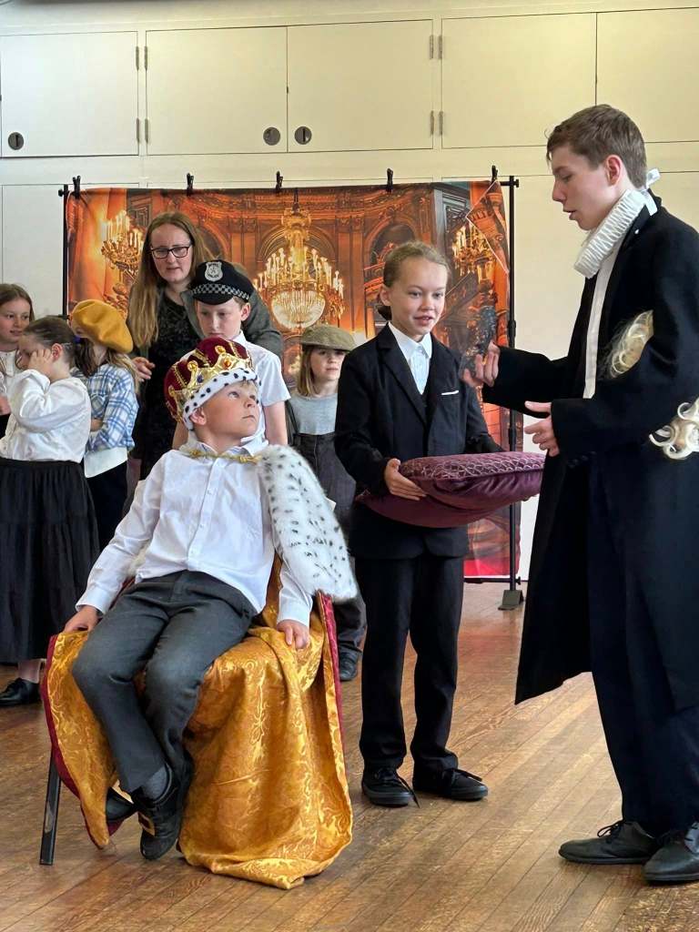 Stagezone children rehearsing with props for Sherlock & Cinders.