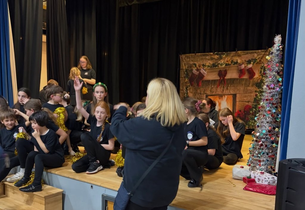 Children on stage at Chacewater Village Hall at Stagezone Youth Theatre's Sparkle & Shine show