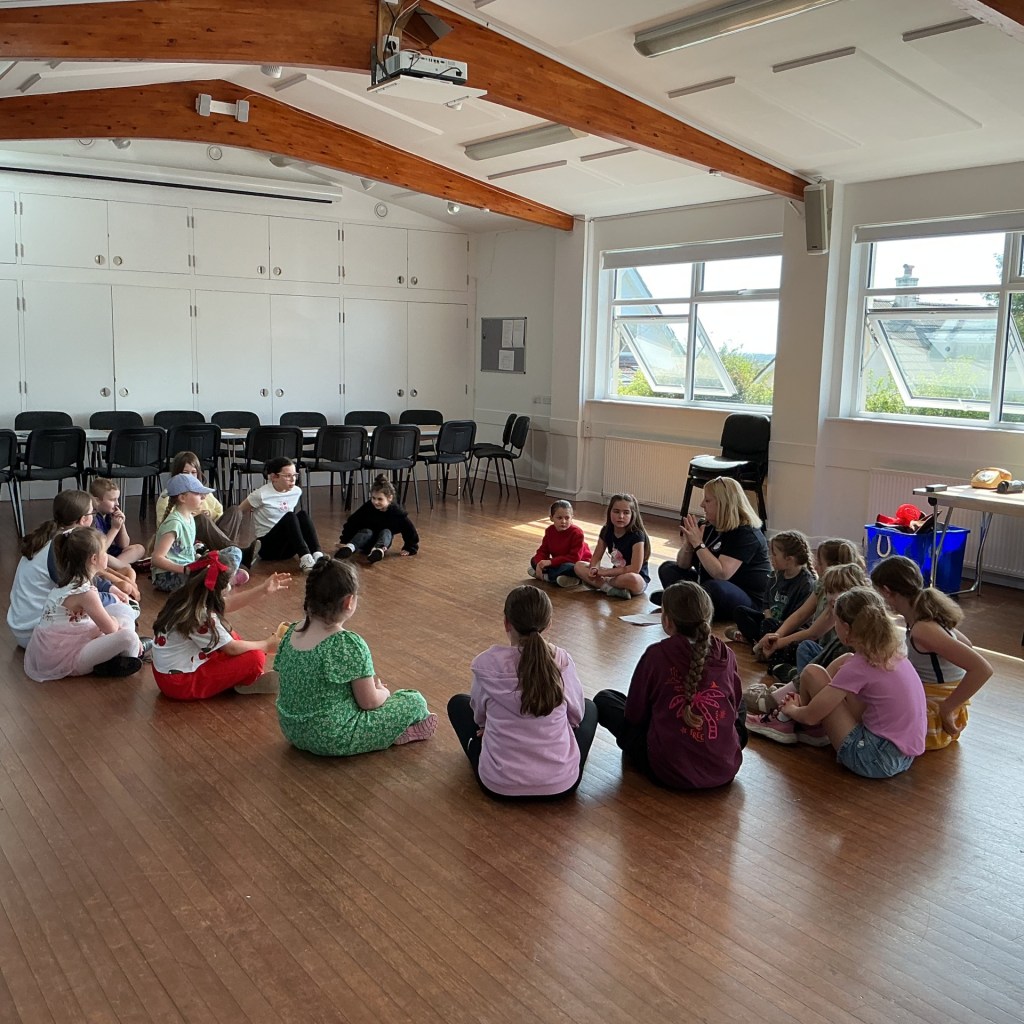Stagezone Drama Workshop kids sitting in a circle
