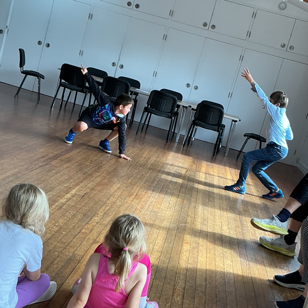 A photo of Stagezone members learning safe stage combat