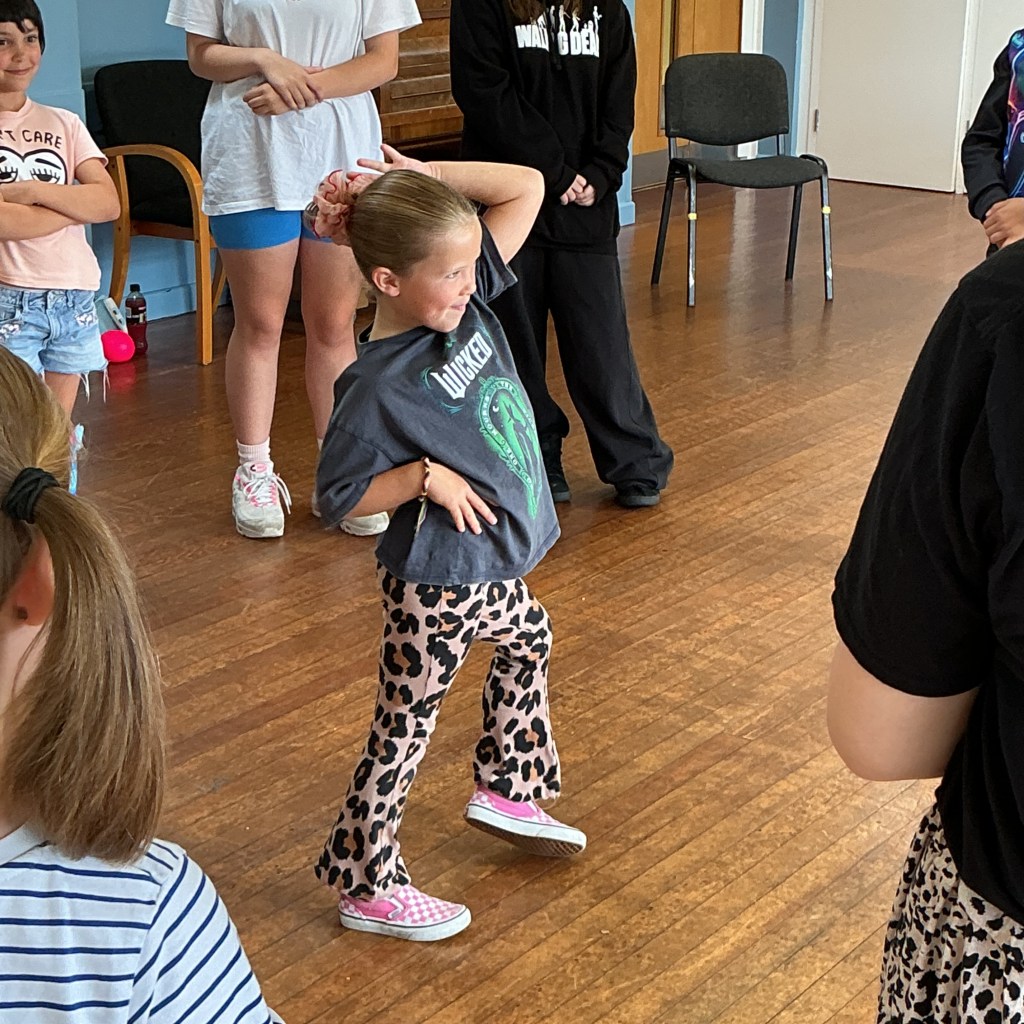 A photo of Stagezone members at a KPOP Demon Hunters Workshop